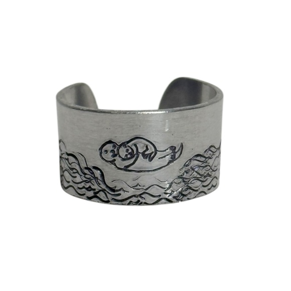 Handmade stamped mama otter ocean design
silver tone adjustable wide cuff ring - Picture 9 of 9